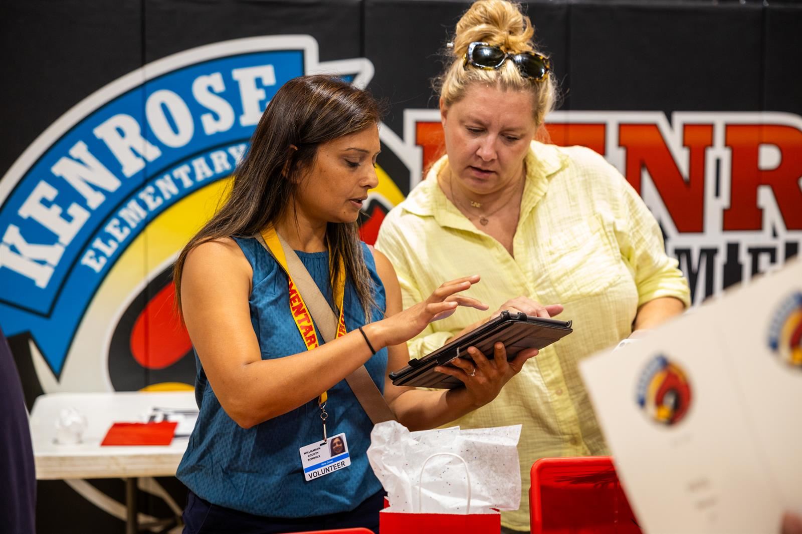 pto lady and other woman using an ipad